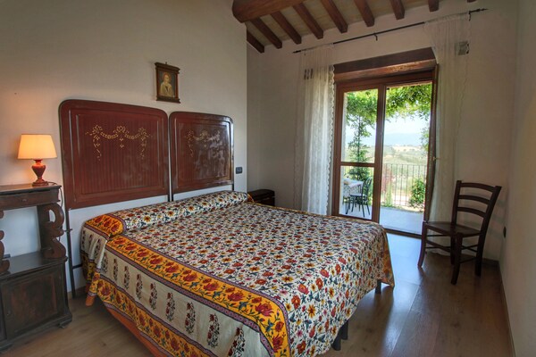 Foto van Boerderijgeluk met zwembad, wijn en cocktails - Vakantiehuis in Gualdo Cattaneo - BedRoom