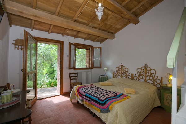 Foto van Vakantiehuis in Assisi met verwarmd zwembad - Vakantiehuis in Assisi - BedRoom