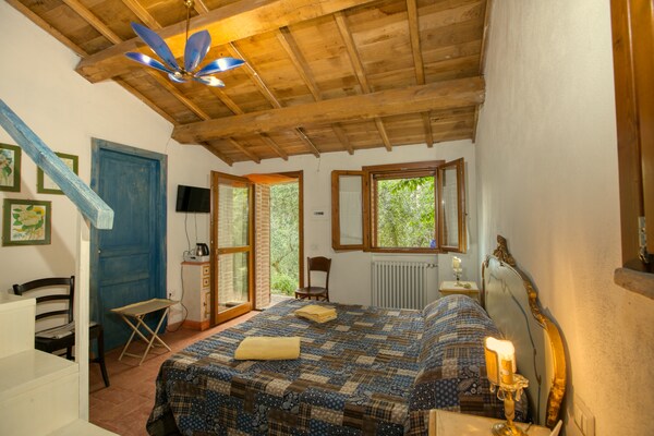 Foto van Vakantiehuis in Assisi met verwarmd zwembad - Vakantiehuis in Assisi - BedRoom