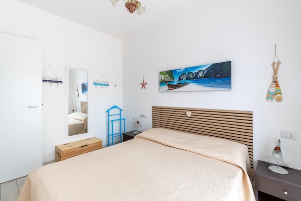 Foto van Zwembad condivisa en giardino privato - Vakantiehuis in Badesi - BedRoom