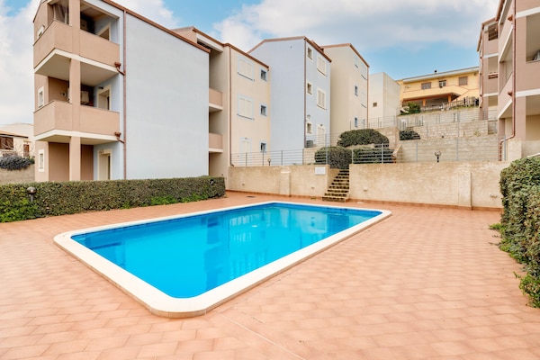 Foto van Zwembad condivisa en giardino privato - Vakantiehuis in Badesi - PoolOfHouse