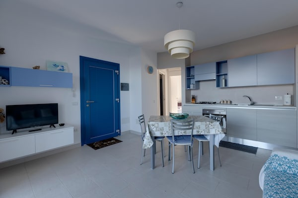 Foto van Zeezicht met airconditioning en tuin - Vakantiehuis in Castelsardo - LivingRoom