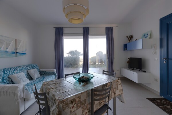 Foto van Zeezicht met airconditioning en tuin - Vakantiehuis in Castelsardo - DiningRoom