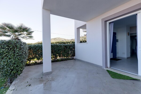Foto van Zeezicht met airconditioning en tuin - Vakantiehuis in Castelsardo - TerraceBalcony