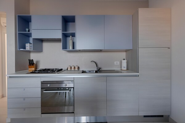 Foto van Zeezicht met airconditioning en tuin - Vakantiehuis in Castelsardo - Kitchen