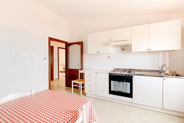 Foto van Appartement met zeezicht in het historische - Vakantiehuis in Castelsardo - Kitchen
