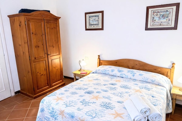 Foto van Appartement met veranda vlakbij Stintino - Vakantiehuis in Stintino - BedRoom