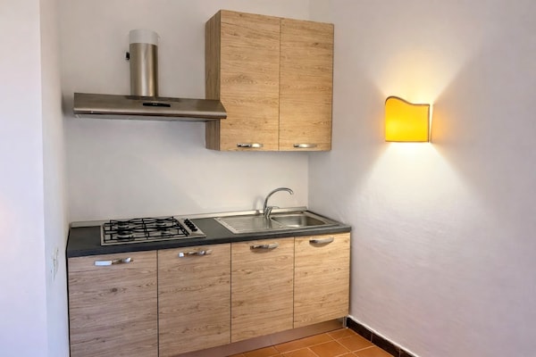 Foto van Appartement met veranda vlakbij Stintino - Vakantiehuis in Stintino - Kitchen