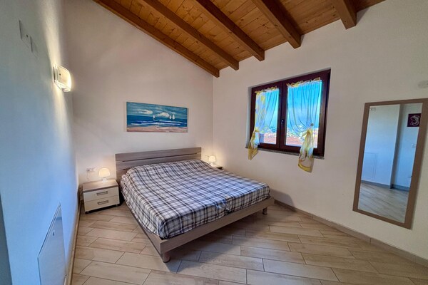 Foto van Appartement met uitzicht op het meer in Bedero - Vakantiehuis in Brezzo di Bedero - BedRoom