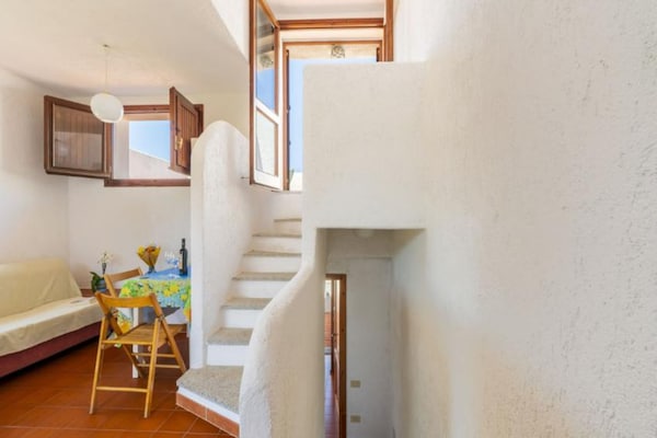 Foto van Appartement met zeezicht en een dakterras - Vakantiehuis in Santa Teresa Gallura - LivingRoom