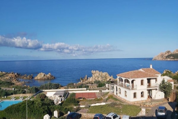 Foto van Appartement met zeezicht en een dakterras - Vakantiehuis in Santa Teresa Gallura - ExteriorSummer
