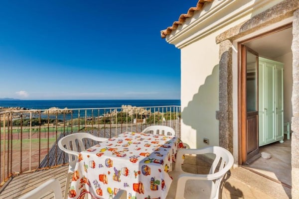 Foto van Appartement met zeezicht en een dakterras - Vakantiehuis in Santa Teresa Gallura - TerraceBalcony