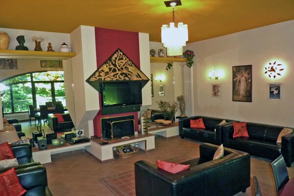 Foto van Villa in Pistoia met Zwembad en Uitzicht - Vakantiehuis in Pistoia - LivingRoom