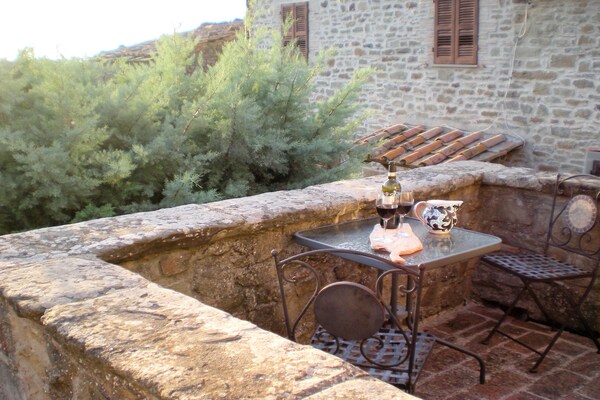 Foto van Boerderij in Cortona met zwembad - Vakantiehuis in Cortona - TerraceBalcony