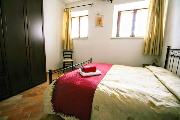 Foto van Boerderij in Toscane met zwembad - Vakantiehuis in Asciano - BedRoom