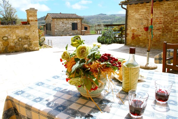 Foto van Boerderij in Toscane met zwembad - Vakantiehuis in Asciano - TerraceBalcony