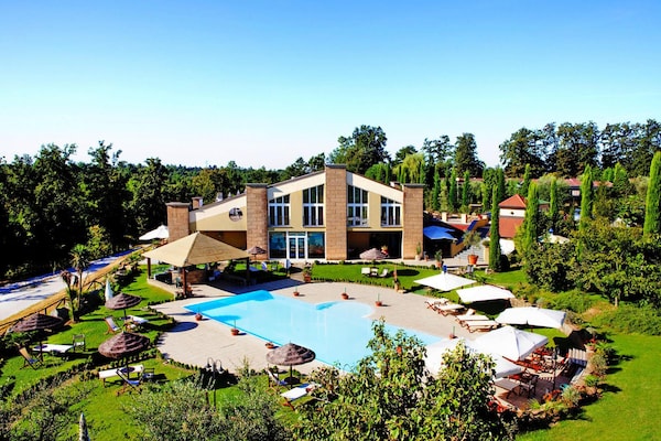 Foto van Appartement in Vinci met zwembad & wellness - Vakantiehuis in Pinete Fucecchio - ExteriorSummer