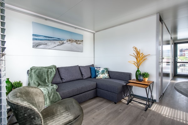Foto van Waterlodge Kamperland met Uitzicht Terras - Vakantiehuis in Kamperland - LivingRoom