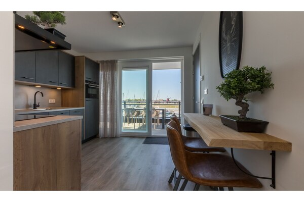 Foto van Appartement Sint Annaland met Havenzicht - Vakantiehuis in St. Annaland - Kitchen