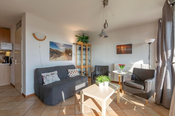 Foto van Appartement aan de kust met duinzicht - Vakantiehuis in Callantsoog - LivingRoom