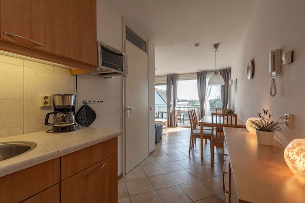 Foto van Appartement aan de kust met duinzicht - Vakantiehuis in Callantsoog - Kitchen