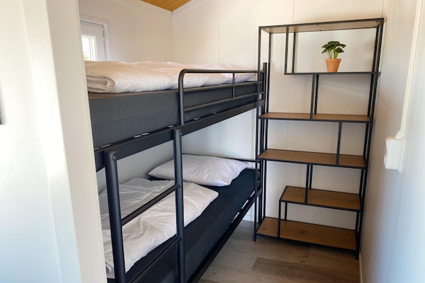 Foto van Chalet aan het water voor 4 in de jachthaven - Vakantiehuis in Almere - BedRoom