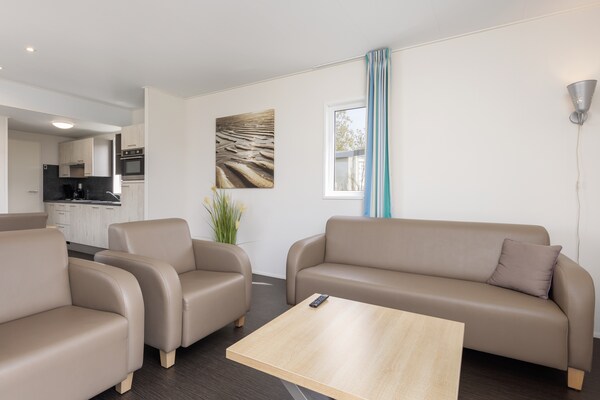Foto van Moderne lodge vlakbij het strand - Vakantiehuis in Callantsoog - LivingRoom