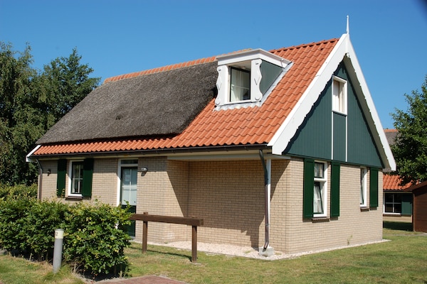 Foto van Moderne bungalows vlakbij het strand - Vakantiehuis in De Koog - ExteriorSummer
