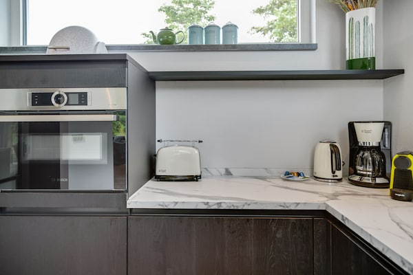 Foto van Bungalow op Texel bij Nationaal Park Duinen - Vakantiehuis in De Koog Texel - Kitchen