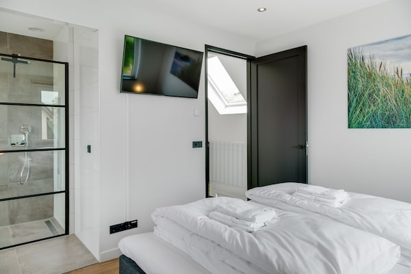 Foto van Bungalow op Texel bij Nationaal Park Duinen - Vakantiehuis in De Koog Texel - BedRoom