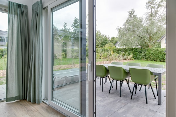 Foto van Bungalow op Texel bij Nationaal Park Duinen - Vakantiehuis in De Koog Texel - TerraceBalcony