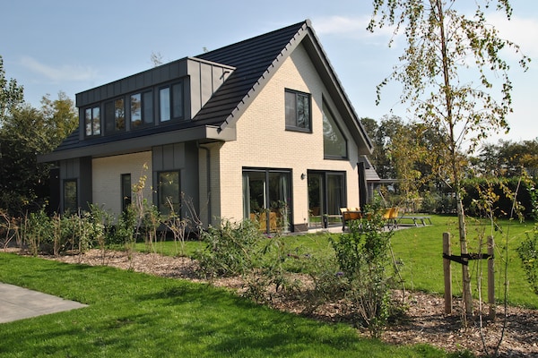 Foto van Bungalow op Texel bij Nationaal Park Duinen - Vakantiehuis in De Koog Texel - ExteriorSummer