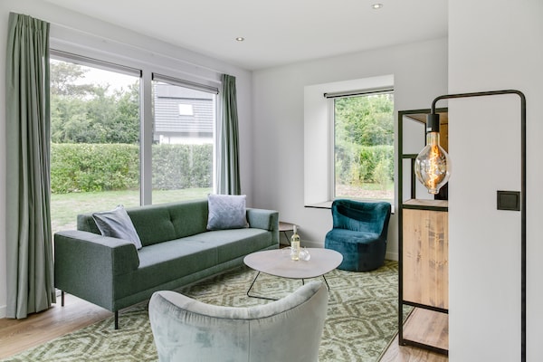 Foto van Bungalow op Texel bij Nationaal Park Duinen - Vakantiehuis in De Koog Texel - LivingRoom