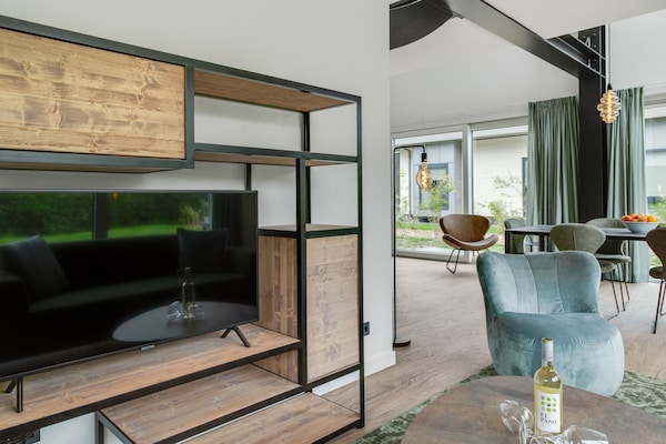 Foto van Bungalow op Texel bij Nationaal Park Duinen - Vakantiehuis in De Koog Texel - LivingRoom