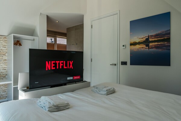 Foto van Villa op Texel bij Strand en Natuurgebied - Vakantiehuis in Den Burg - BedRoom