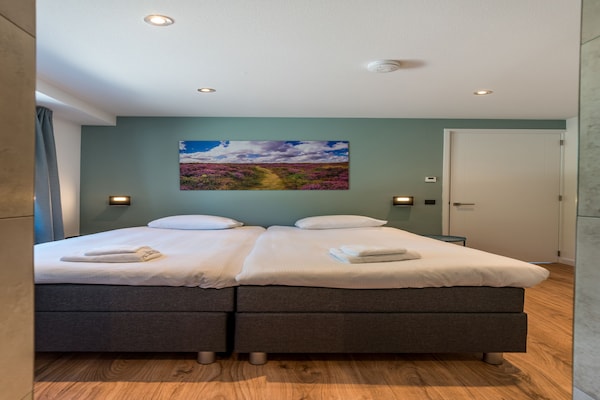 Foto van Villa op Texel bij Strand en Natuurgebied - Vakantiehuis in Den Burg - BedRoom