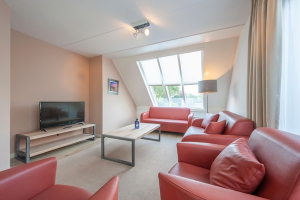 Foto van Villa in Zeeland dicht bij het strand - Vakantiehuis in Scharendijke - LivingRoom