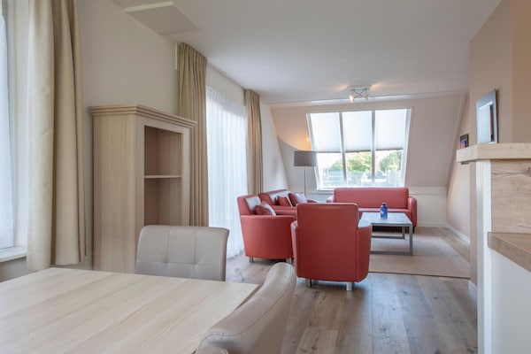 Foto van Villa in Zeeland dicht bij het strand - Vakantiehuis in Scharendijke - LivingRoom
