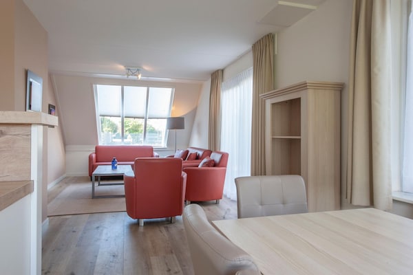 Foto van Villa in Zeeland dicht bij het strand - Vakantiehuis in Scharendijke - LivingRoom