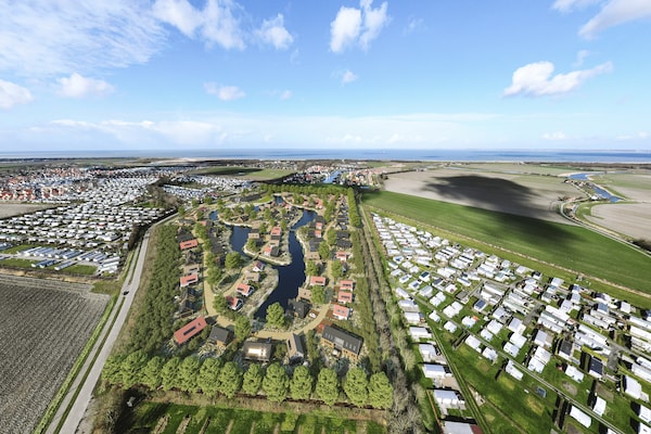 Foto van Luxe villa in Nieuwvliet-Bad met privézwembad - Vakantiehuis in Nieuwvliet - ExteriorSummer