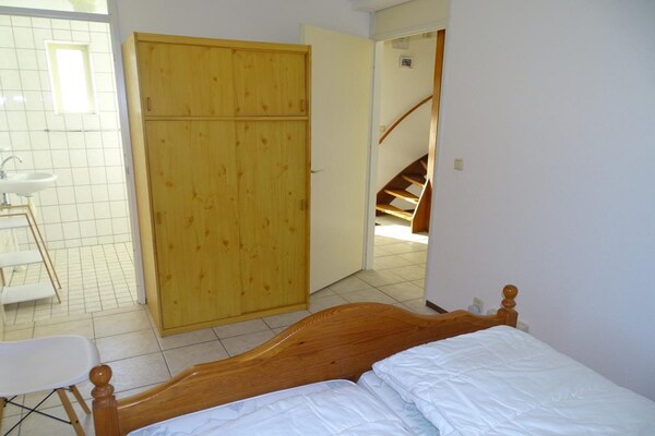 Foto van Bungalow in Breskens bij Strand en Vuurtoren - Vakantiehuis in Breskens - BedRoom