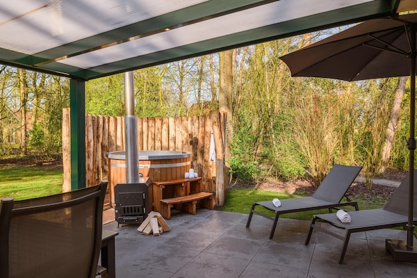 Foto van Weelderige bungalow met privé-bubbelbad - Vakantiehuis in Diessen-Baarschot - Wellness