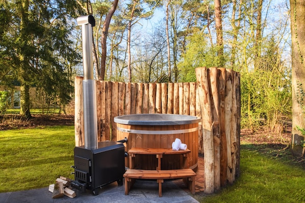 Foto van Weelderige bungalow met privé-bubbelbad - Vakantiehuis in Diessen-Baarschot - Wellness