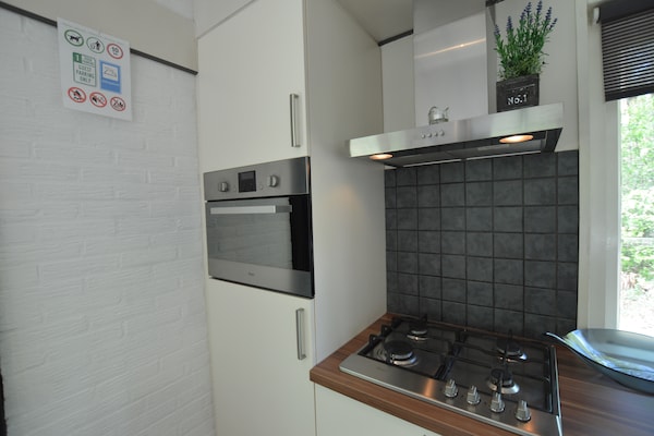 Foto van Romantisch bosverblijf met sauna - Vakantiehuis in Stramproy - Kitchen