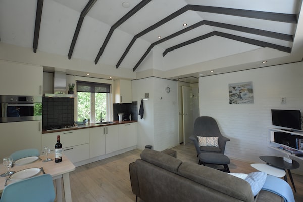 Foto van Romantisch bosverblijf met sauna - Vakantiehuis in Stramproy - LivingRoom