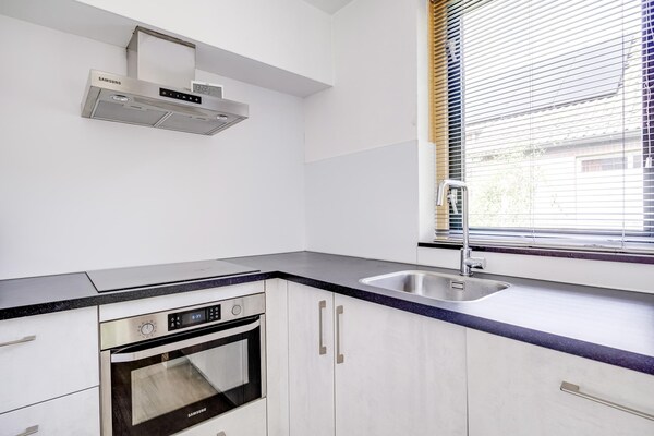 Foto van Bosbungalow voor 5 gasten in Ewijk - Vakantiehuis in Ewijk - Kitchen