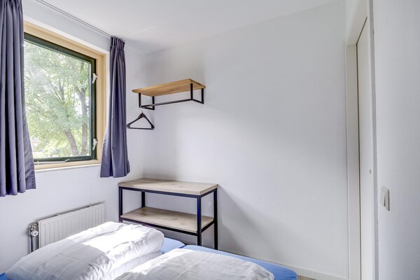 Foto van Bosbungalow voor 5 gasten in Ewijk - Vakantiehuis in Ewijk - BedRoom
