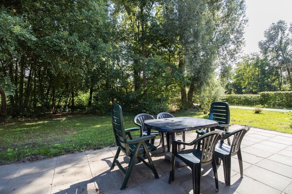 Foto van Bosbungalow voor 5 gasten in Ewijk - Vakantiehuis in Ewijk - TerraceBalcony