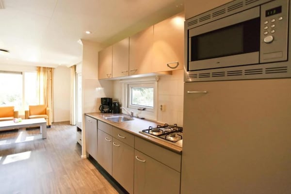 Foto van Chalet met groen en terras - Vakantiehuis in Otterlo - Kitchen