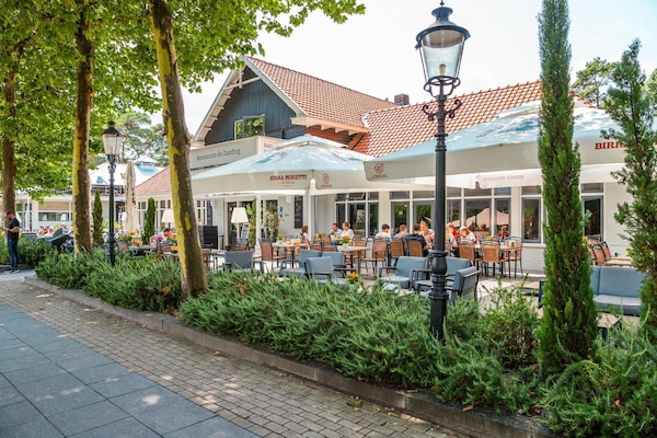 Foto van Chalet met groen en terras - Vakantiehuis in Otterlo - AreaSummer1KM
